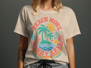 Light tan t-shirt with "Beach More Worry Less" text and tropical island graphic.