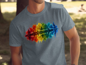 Grey t-shirt with a rainbow watercolor forest reflection print.