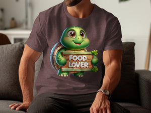 Cute cartoon turtle on a shirt holding a wooden sign that says "FOOD LOVER".