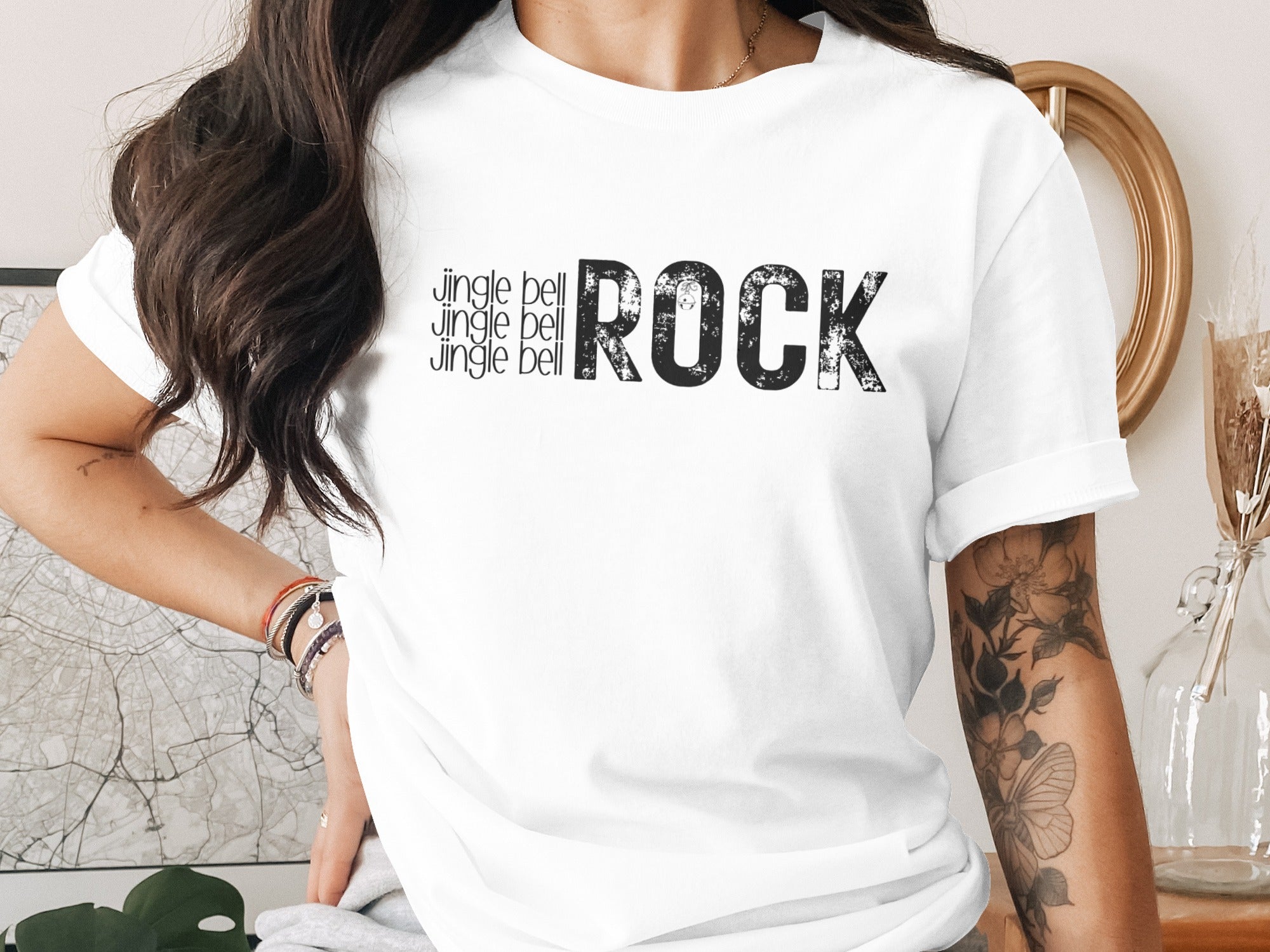 White t-shirt with "Jingle Bell Rock" graphic text.