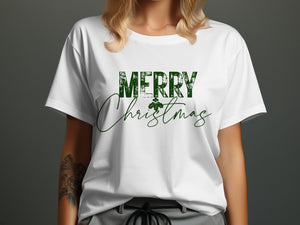 White t-shirt with green distressed "MERRY CHRISTMAS" text and a holly sprig.