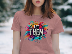 T-shirt with colorful abstract design and "LET THEM" text graphic