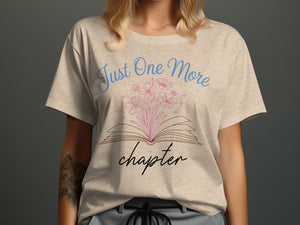 Light beige t-shirt with "Just One More chapter" book and flower graphic.