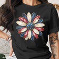 Black t-shirt with a patriotic flower graphic featuring American flag colors and stars.