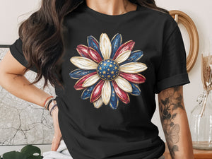 Black t-shirt with a patriotic flower graphic featuring American flag colors and stars.