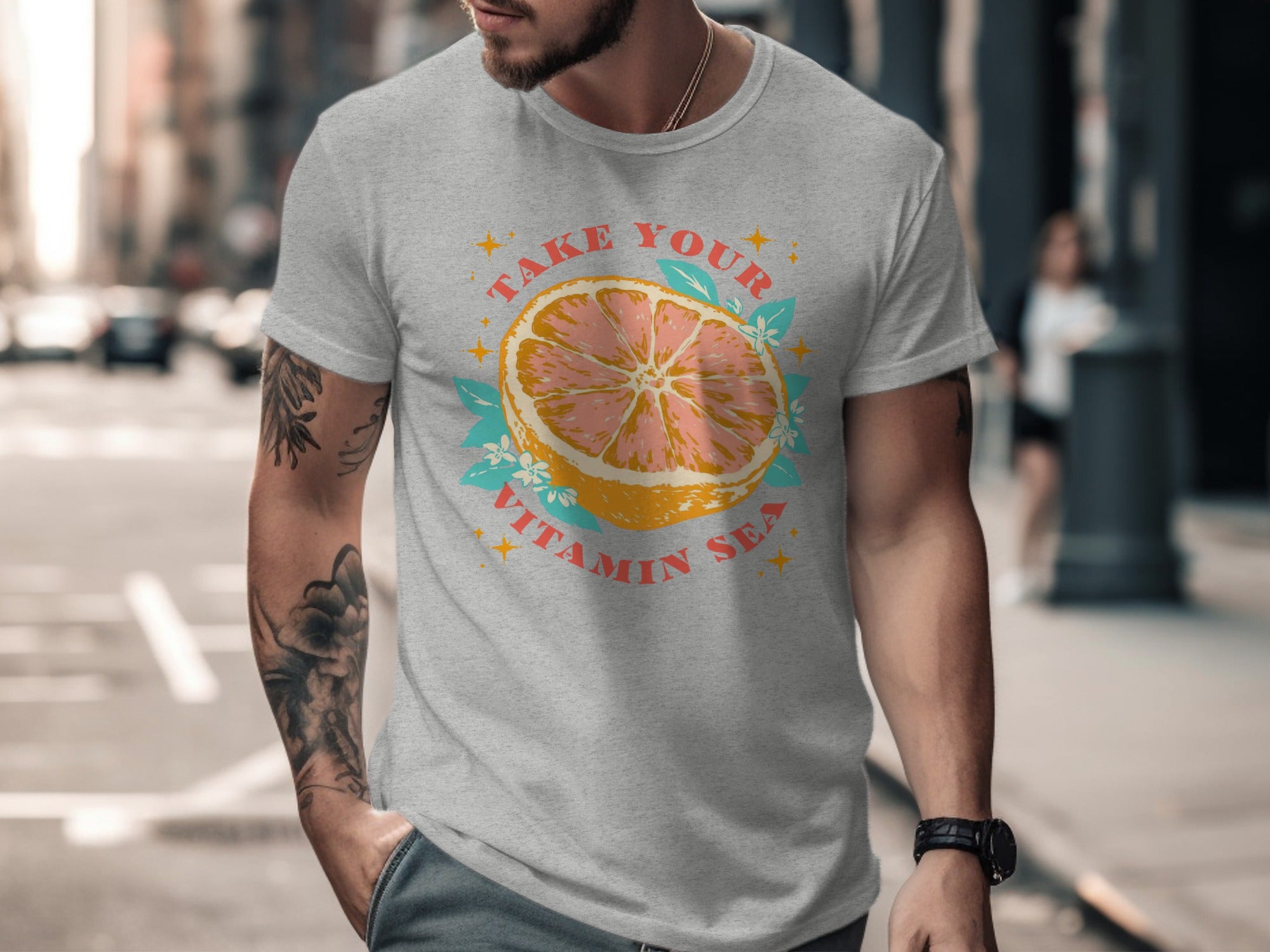 Grey t-shirt with a grapefruit slice graphic and "Take Your Vitamin Sea" text