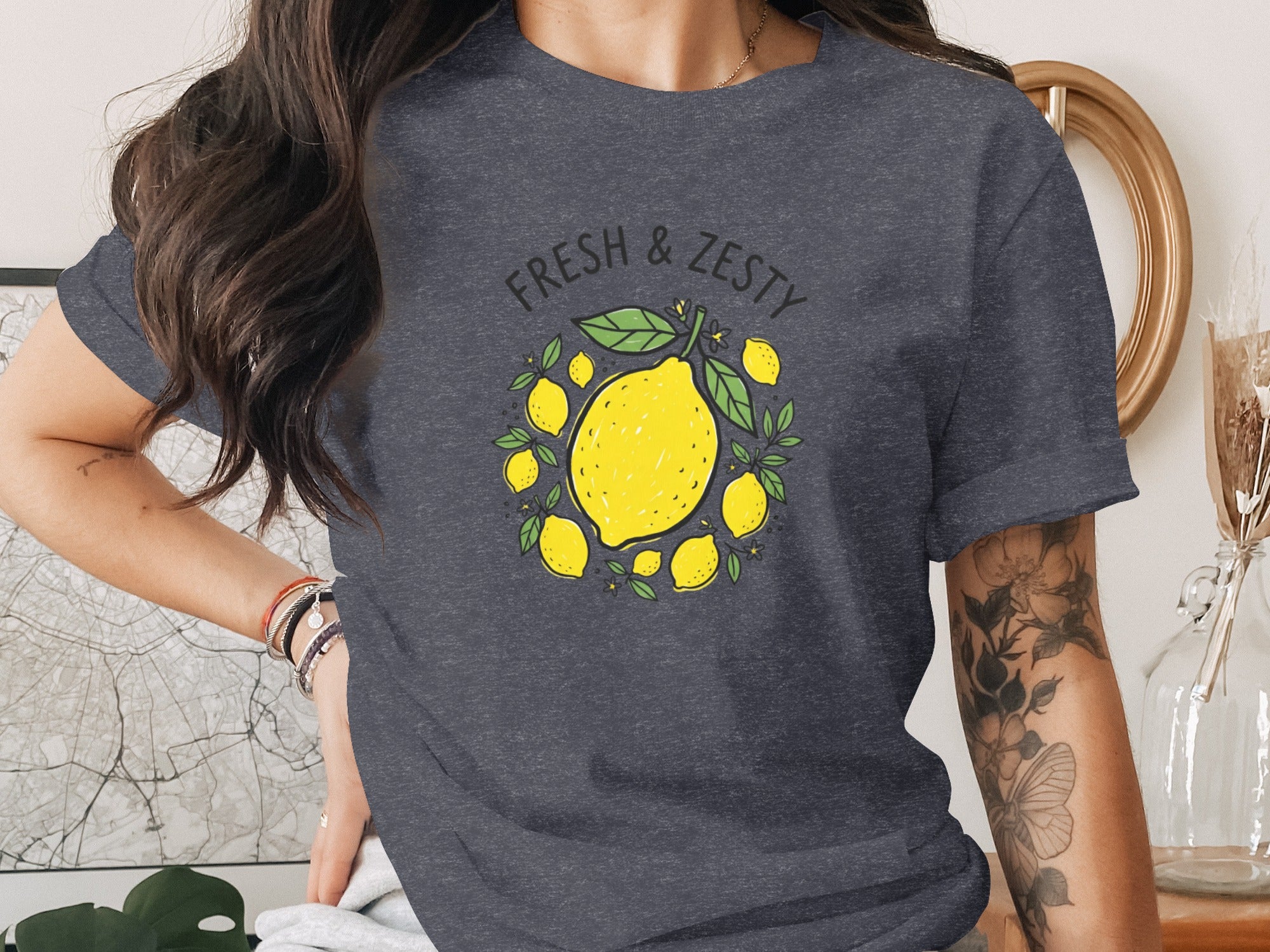 Dark grey t-shirt with yellow lemons and text reading "FRESH & ZESTY".