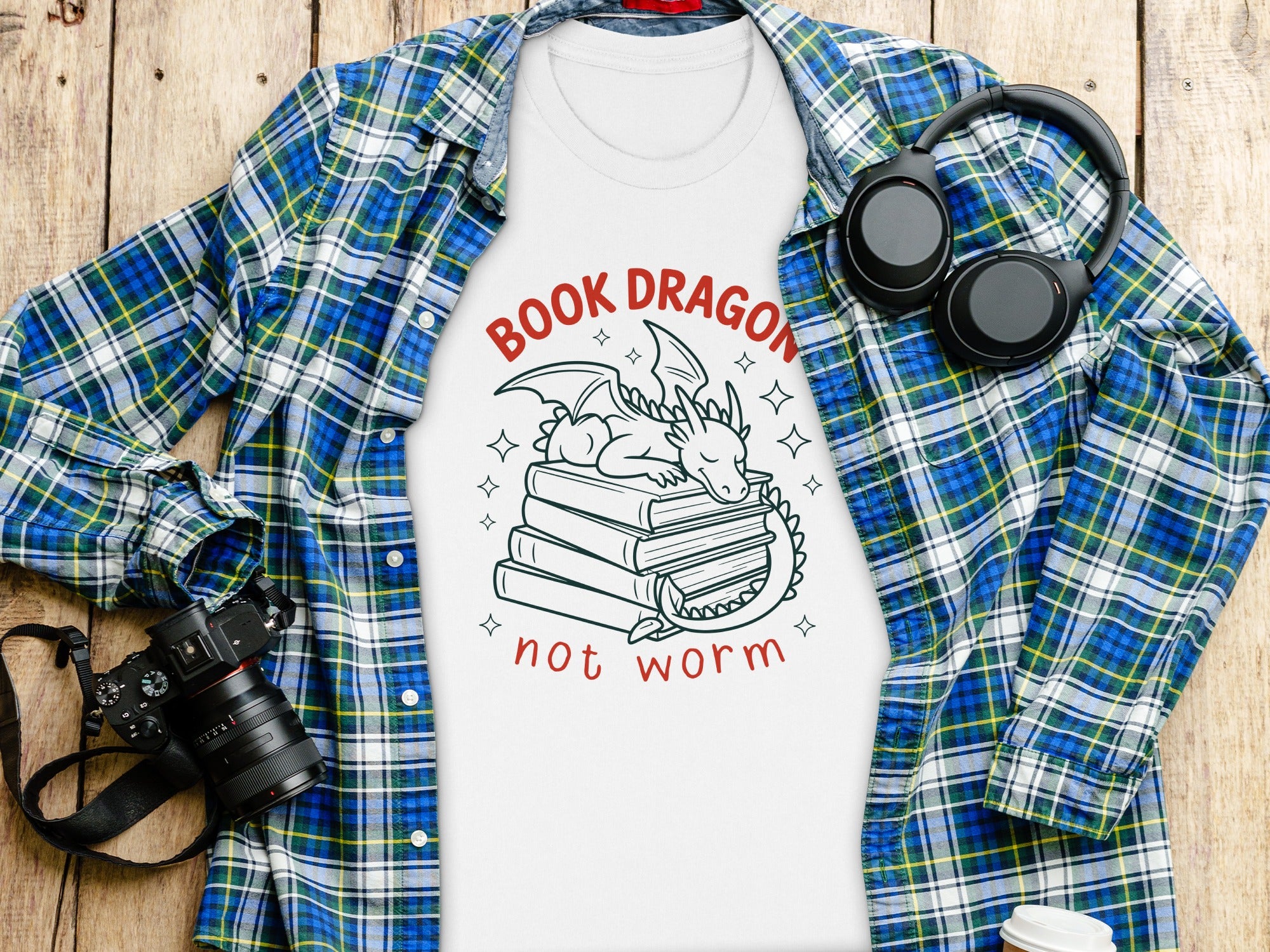 White t-shirt with cartoon dragon and books, reading "Book Dragon" and "not worm".