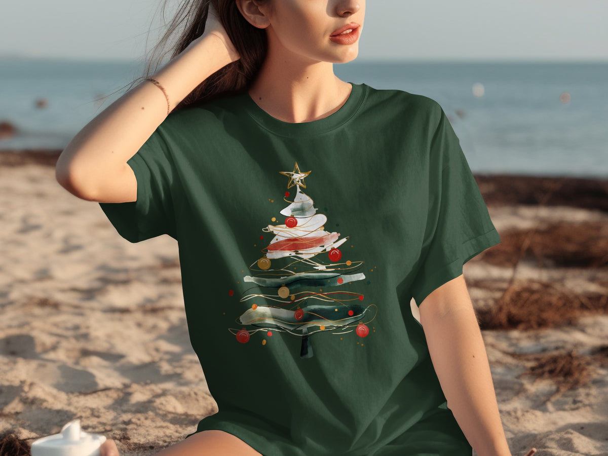 Green t-shirt with abstract Christmas tree design featuring ornaments and a star.