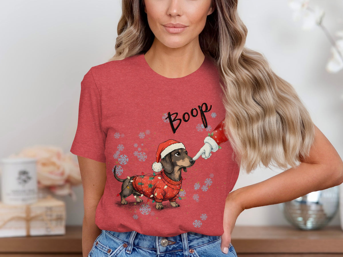 Red t-shirt with a dachshund in a Santa hat and Christmas lights, word "Boop".