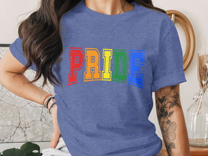 Blue t-shirt with "PRIDE" text in rainbow colors.