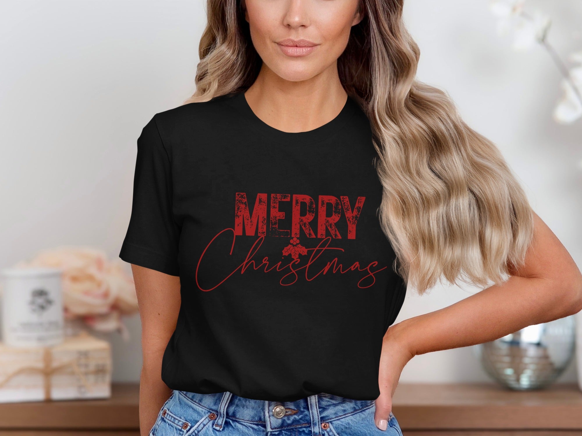 Black t-shirt with distressed red "Merry Christmas" text and holly sprig.