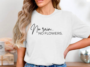 White t-shirt with black text: "No rain... NO FLOWERS."