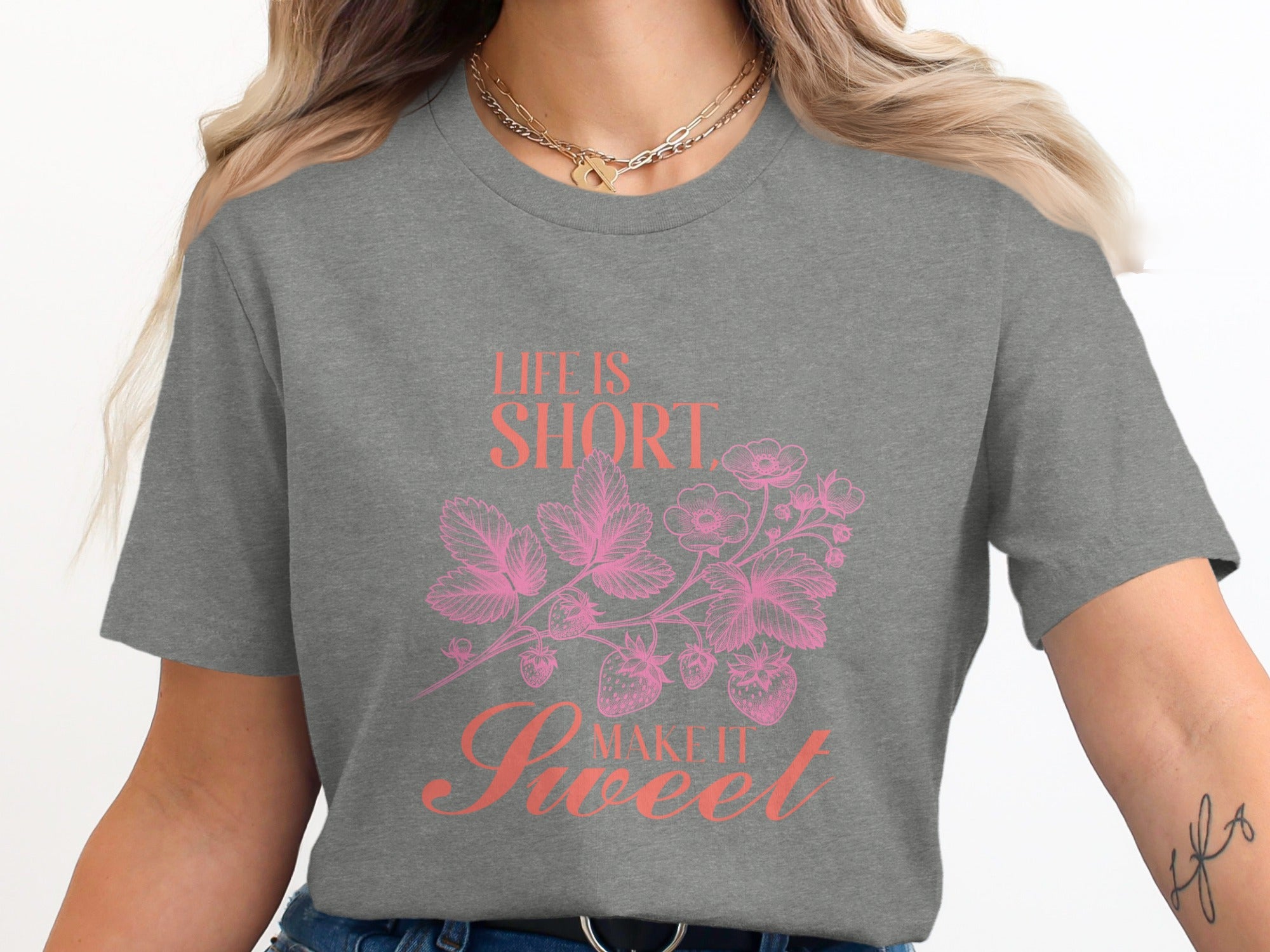 Grey t-shirt with "Life is short make it sweet" and strawberry graphic.