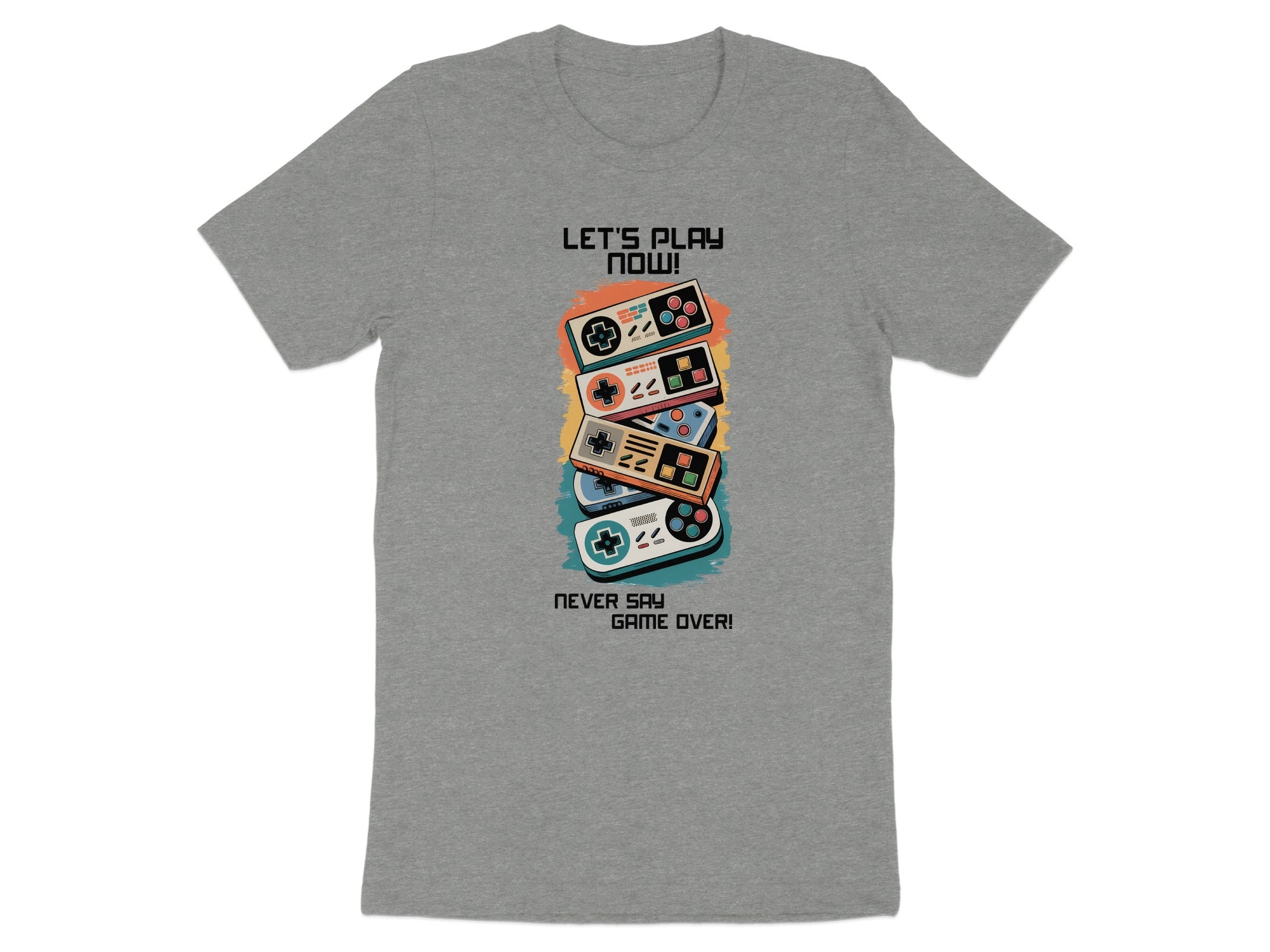 Grey t-shirt with stacked video game controllers and text "LET'S PLAY NOW!" and "NEVER SAY GAME OVER!".