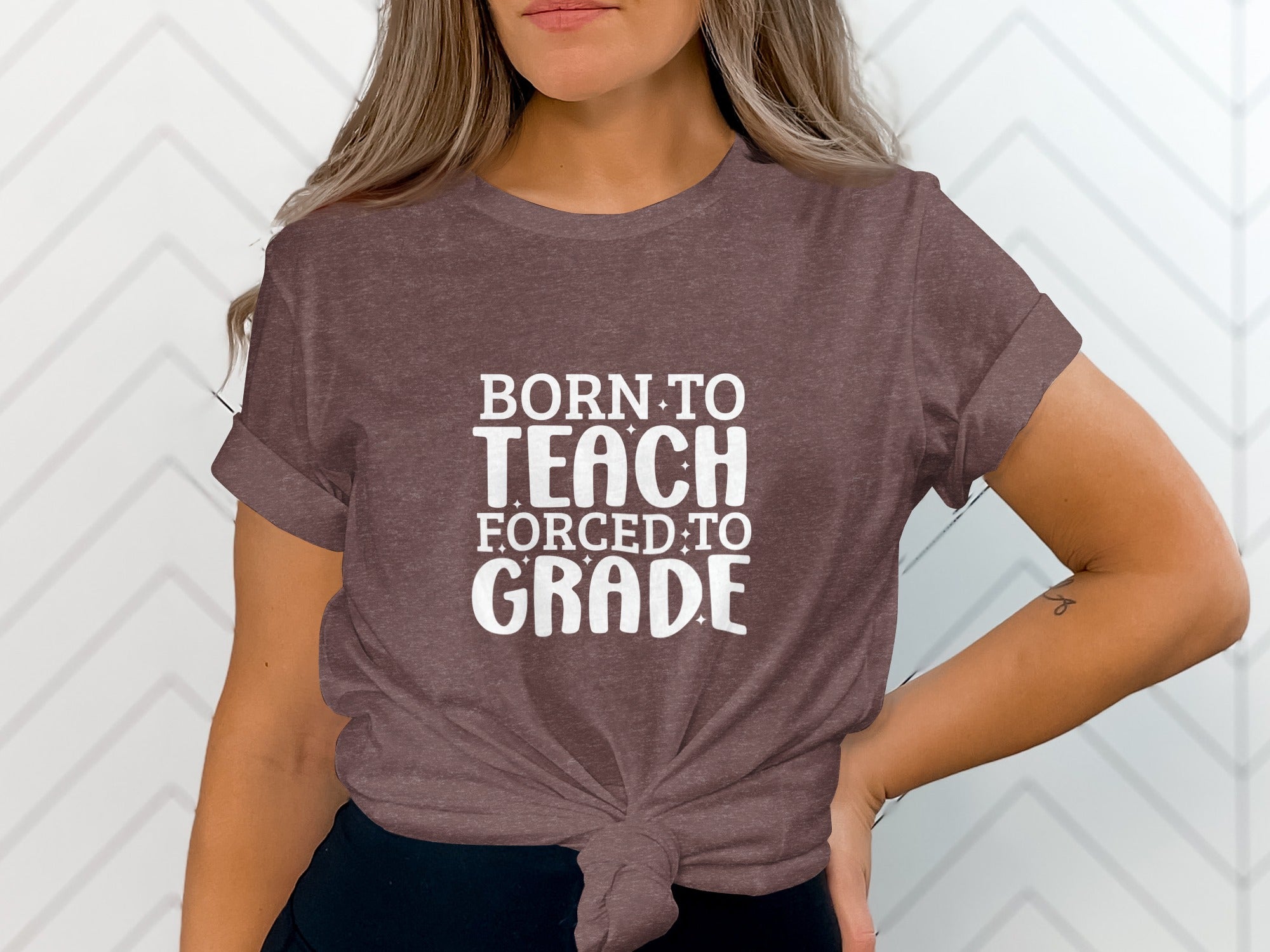 Brown t-shirt with white text that reads "Born to Teach Forced to Grade."