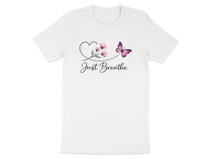 White t-shirt with a pink butterfly, flowers, and "Just Breathe" text.