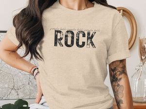 Light beige t-shirt with "jingle bells jingle bells jingle bell ROCK" graphic.