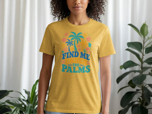 Yellow t-shirt with "Find me under the palms" text and tropical graphics.