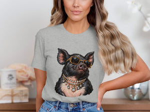 T-shirt with a graphic of a black pig wearing sunglasses and diamond necklaces.