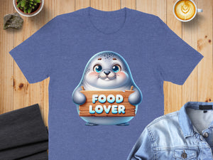 Seal graphic with "FOOD LOVER" text on a heathered blue t-shirt.