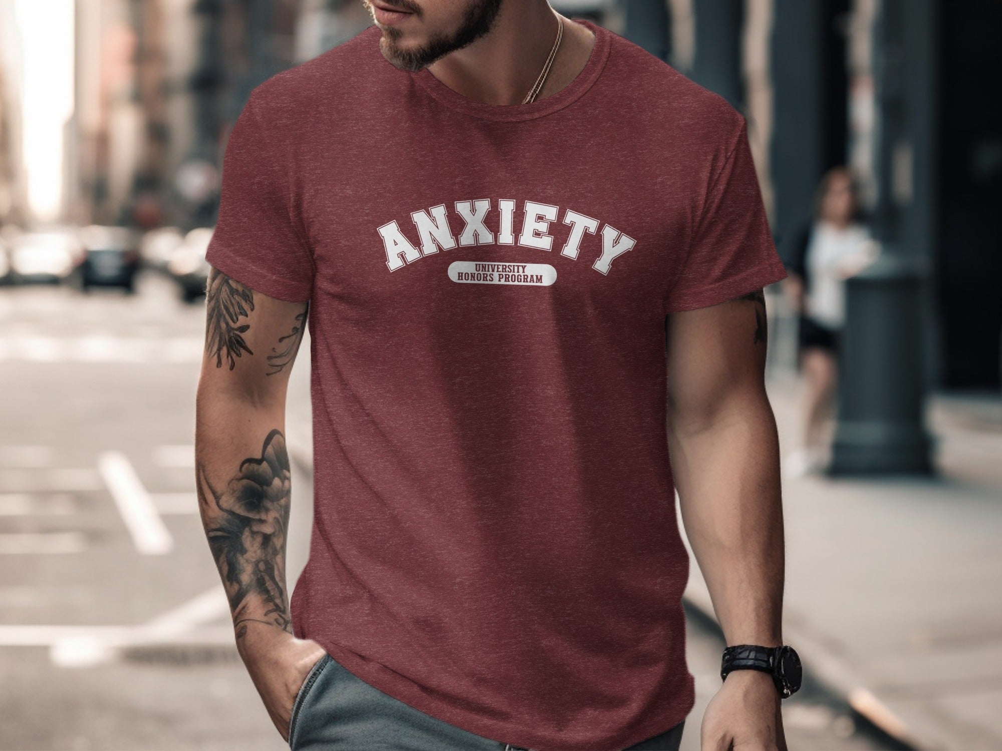 Maroon t-shirt with white text "ANXIETY" and "UNIVERSITY HONORS PROGRAM".