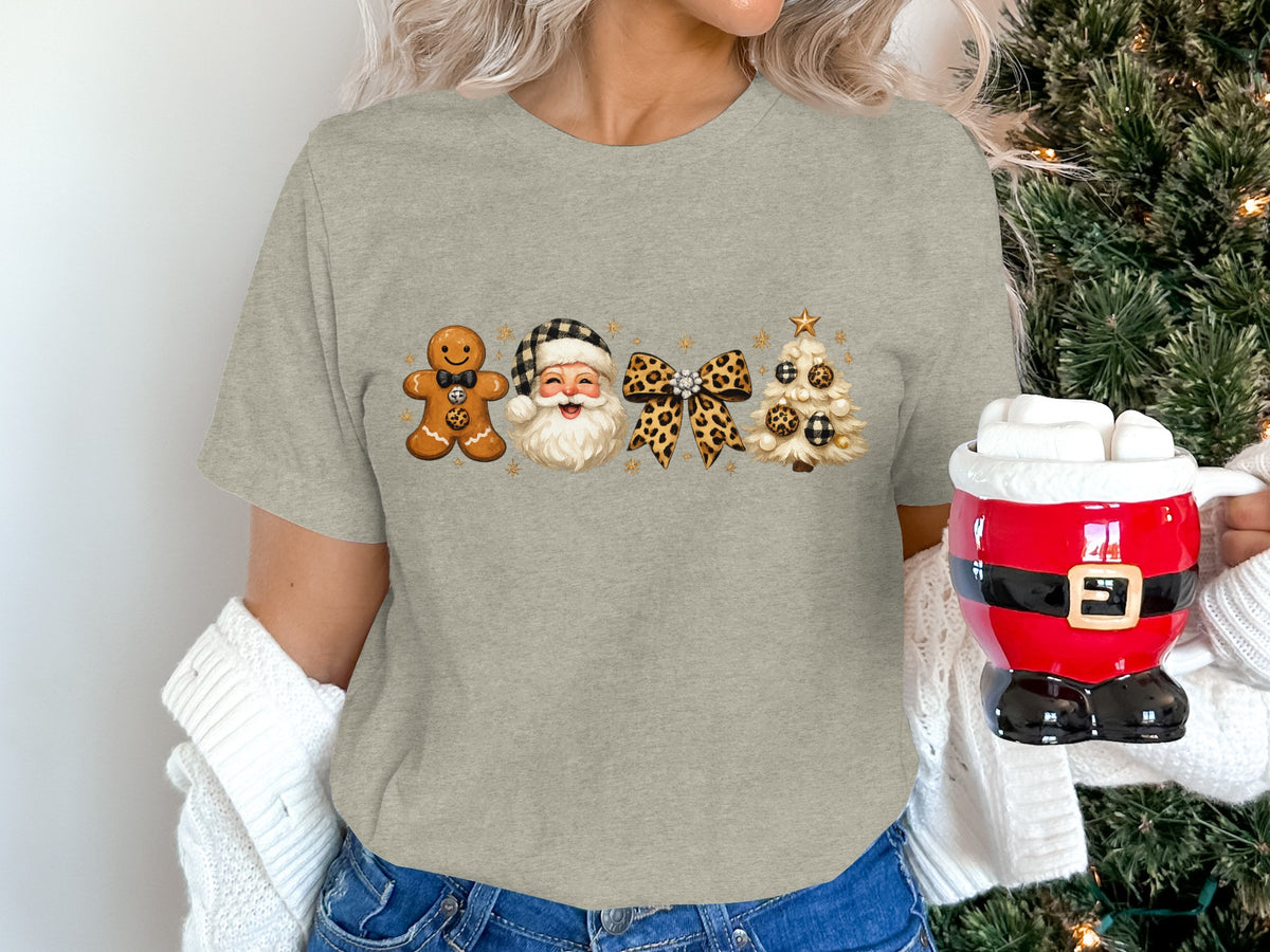 Gray t-shirt with gingerbread man, Santa, leopard bow, and Christmas tree graphics.