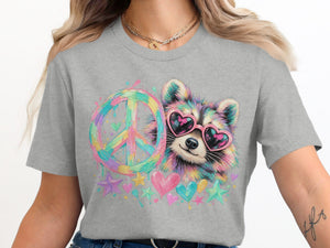 Raccoon wearing heart sunglasses next to a colorful peace sign with hearts and stars.