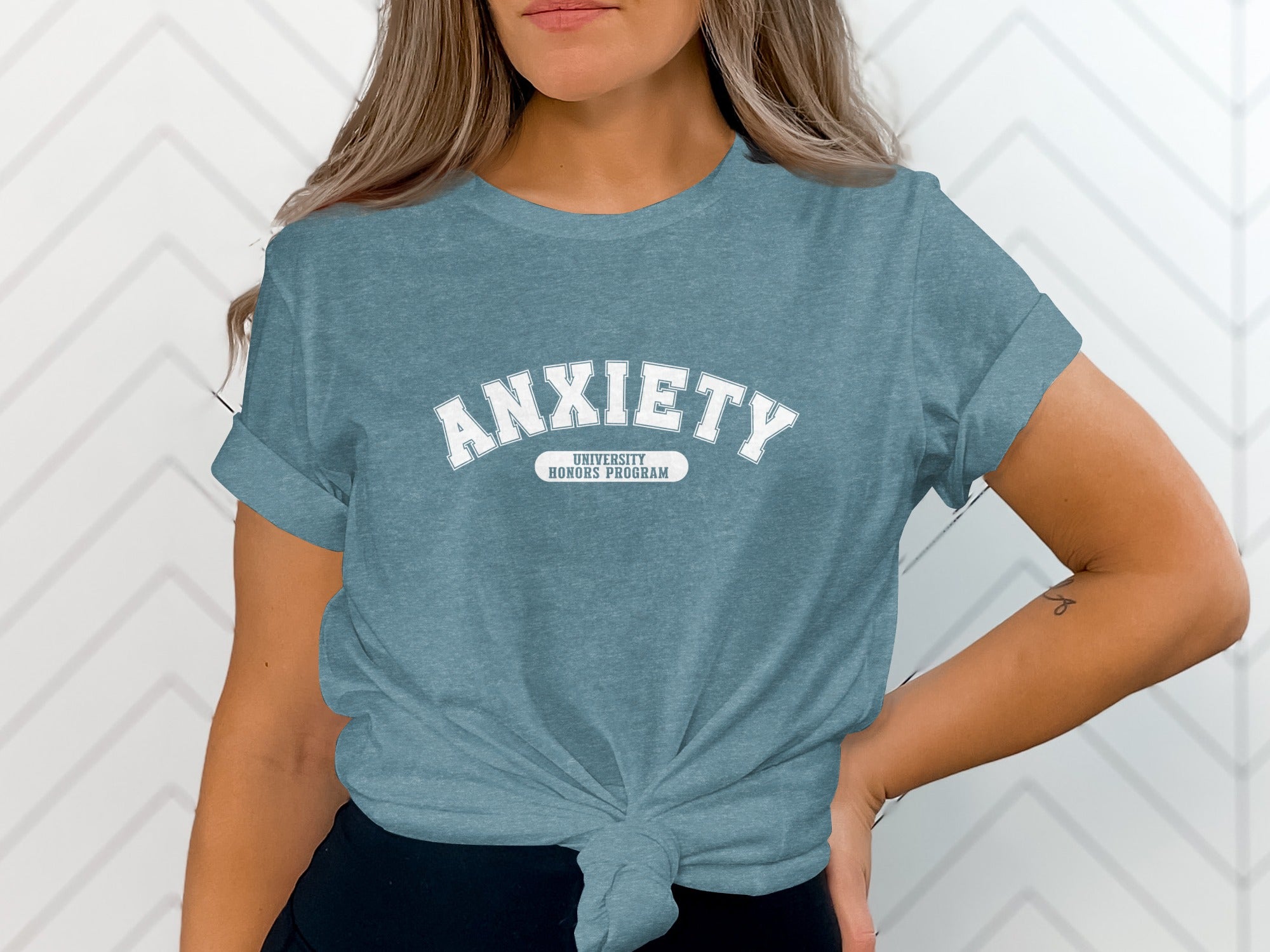 Teal t-shirt with "Anxiety University Honors Program" in white lettering on the front.