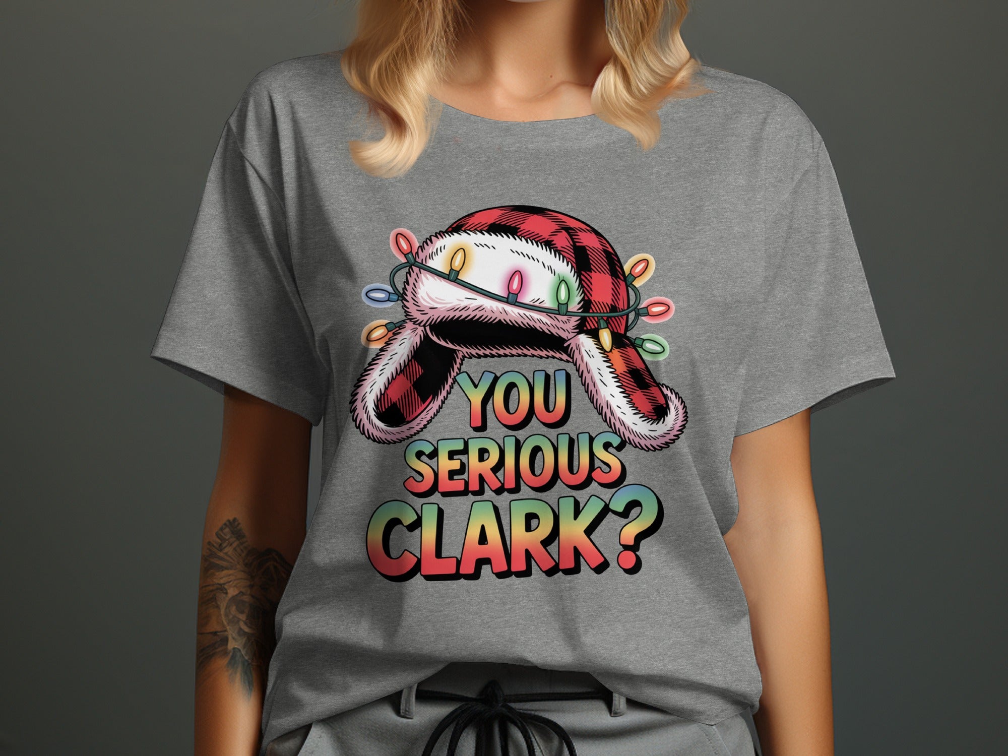 Grey t-shirt with a red plaid trapper hat and "You Serious Clark?" text.