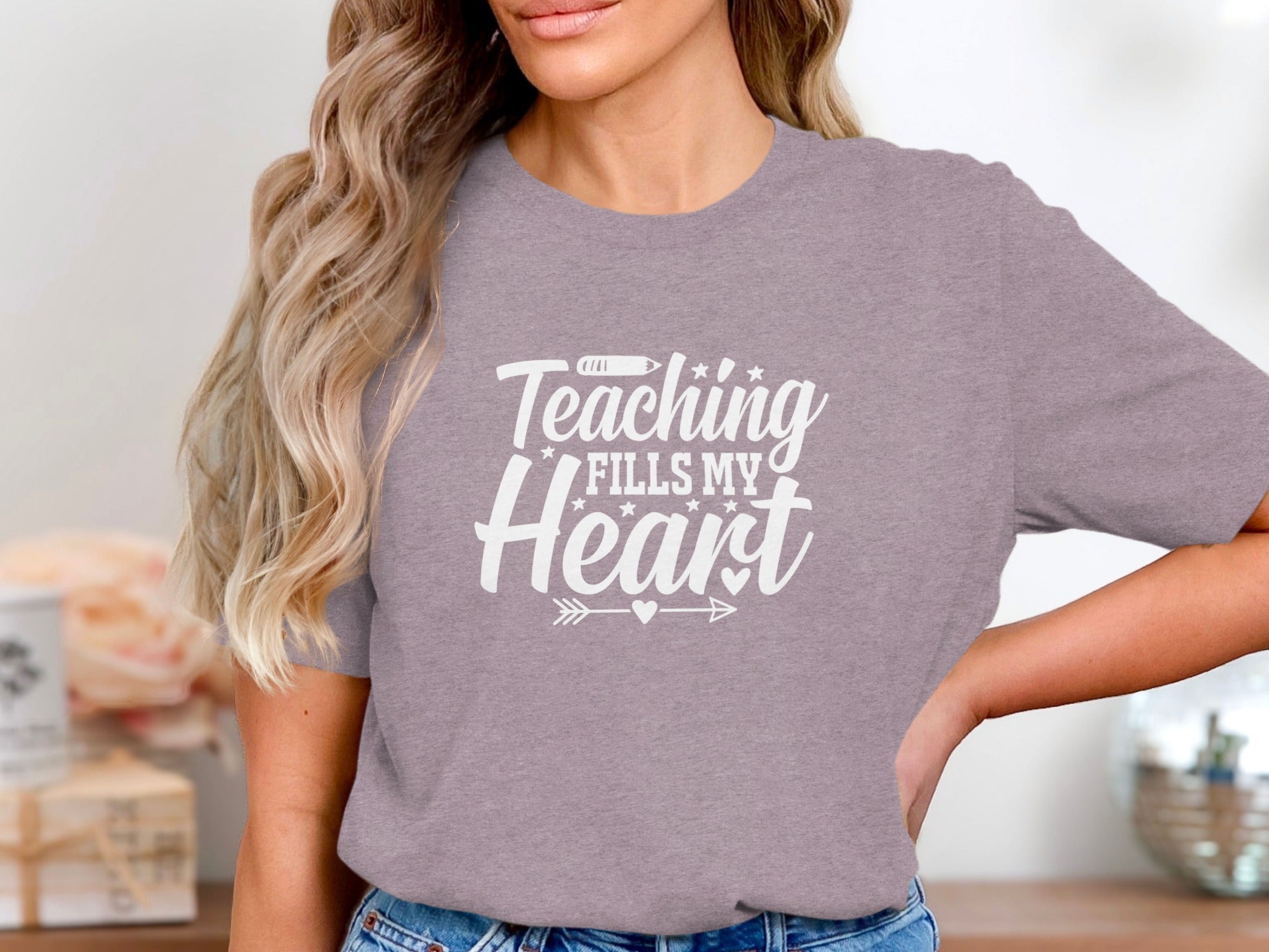Gray t-shirt with white text stating "Teaching Fills My Heart".