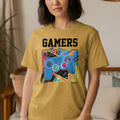 Yellow t-shirt with "GAMERS" text and a blue video game controller graphic.