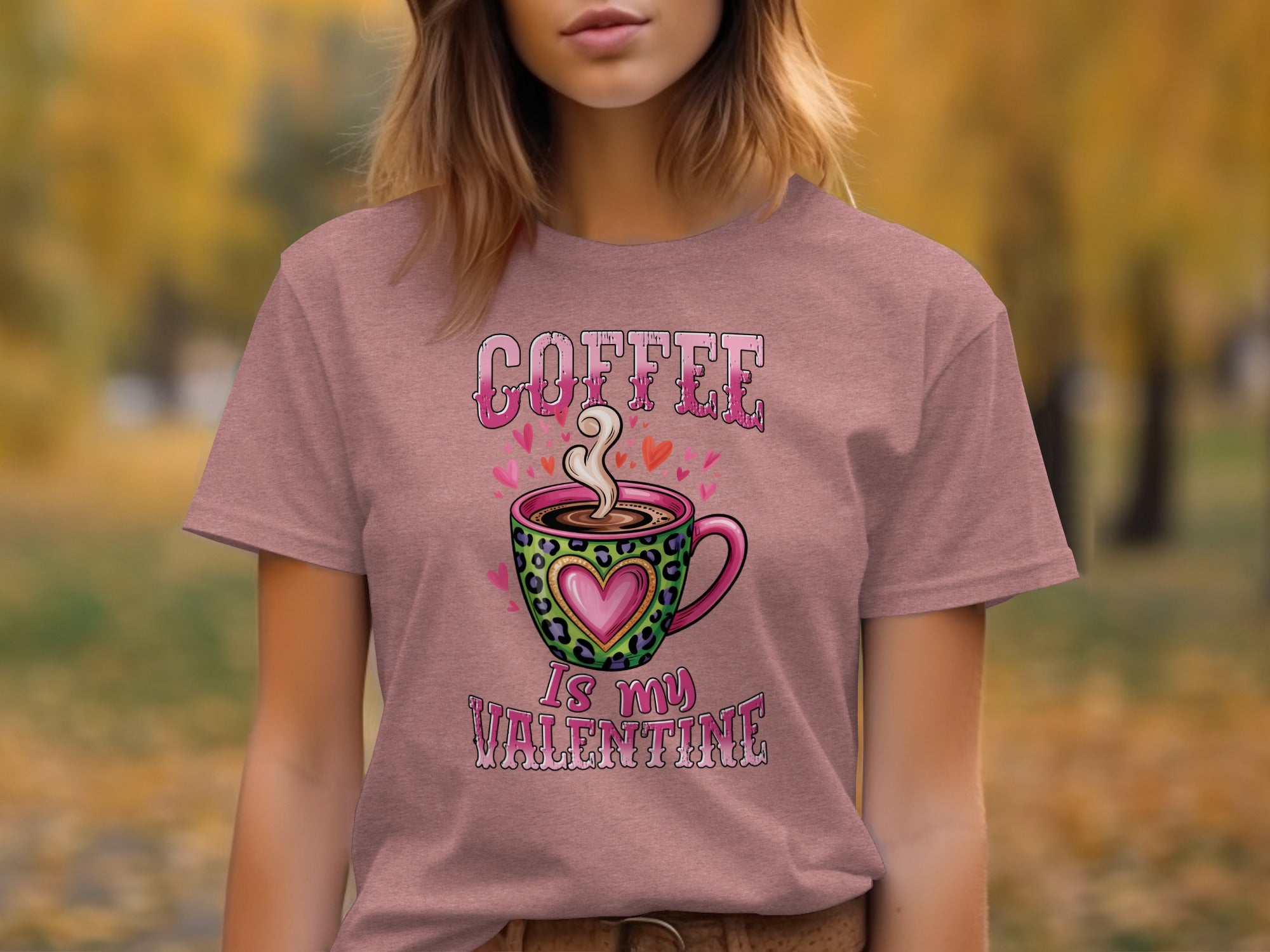 Pink t-shirt with "COFFEE IS MY VALENTINE" text and a coffee cup design.