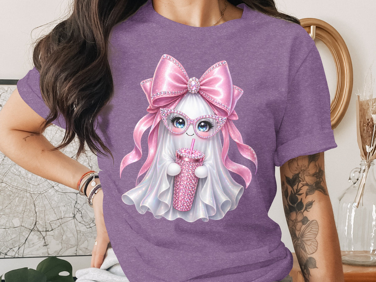 Ghost with pink bow, glasses, and rhinestone cup on a purple t-shirt.
