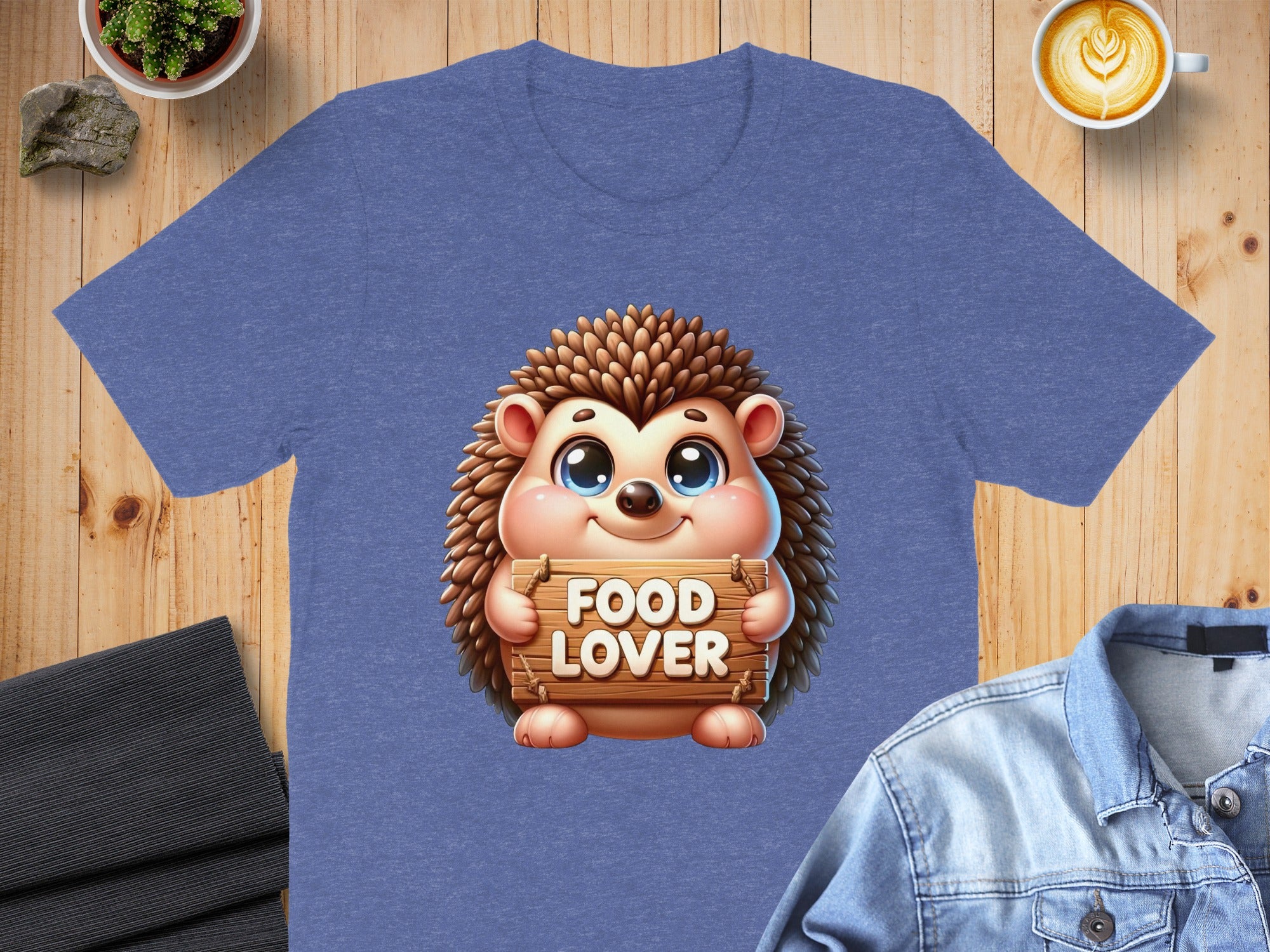 Blue t-shirt with cartoon hedgehog holding "FOOD LOVER" sign