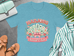 Mahjong tiles and text reading "Mahjong Social Club" on a blue t-shirt.