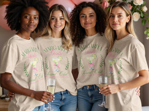 Four women wearing matching oatmeal-colored t-shirts that read Margarita Girls Social Club stand together.
