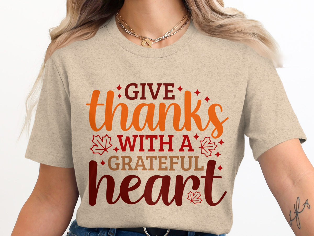 T-shirt with "Give thanks with a grateful heart" text in fall colors.