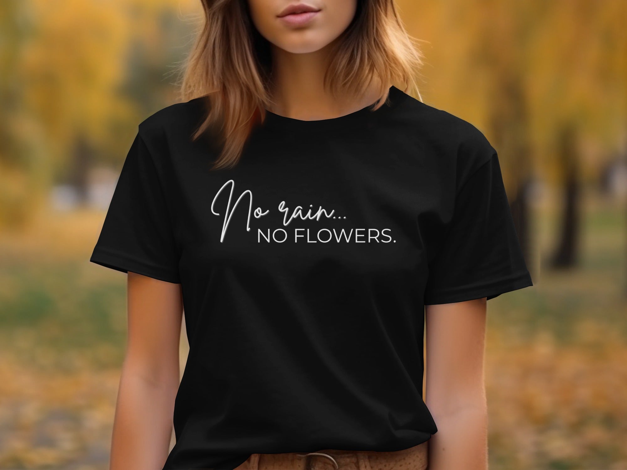 Black t-shirt with white text "No rain... NO FLOWERS."