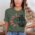 Green t-shirt with a clock graphic made of books, reading "So Many Books So Little Time".