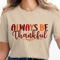 T-shirt with "ALWAYS BE Thankful" text and fall leaf graphics.