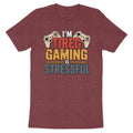 Maroon t-shirt with "I'm Tired Gaming Is Stressful" text and game controllers.