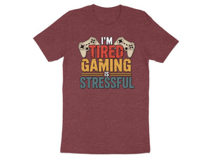 Maroon t-shirt with "I'm Tired Gaming Is Stressful" text and game controllers.