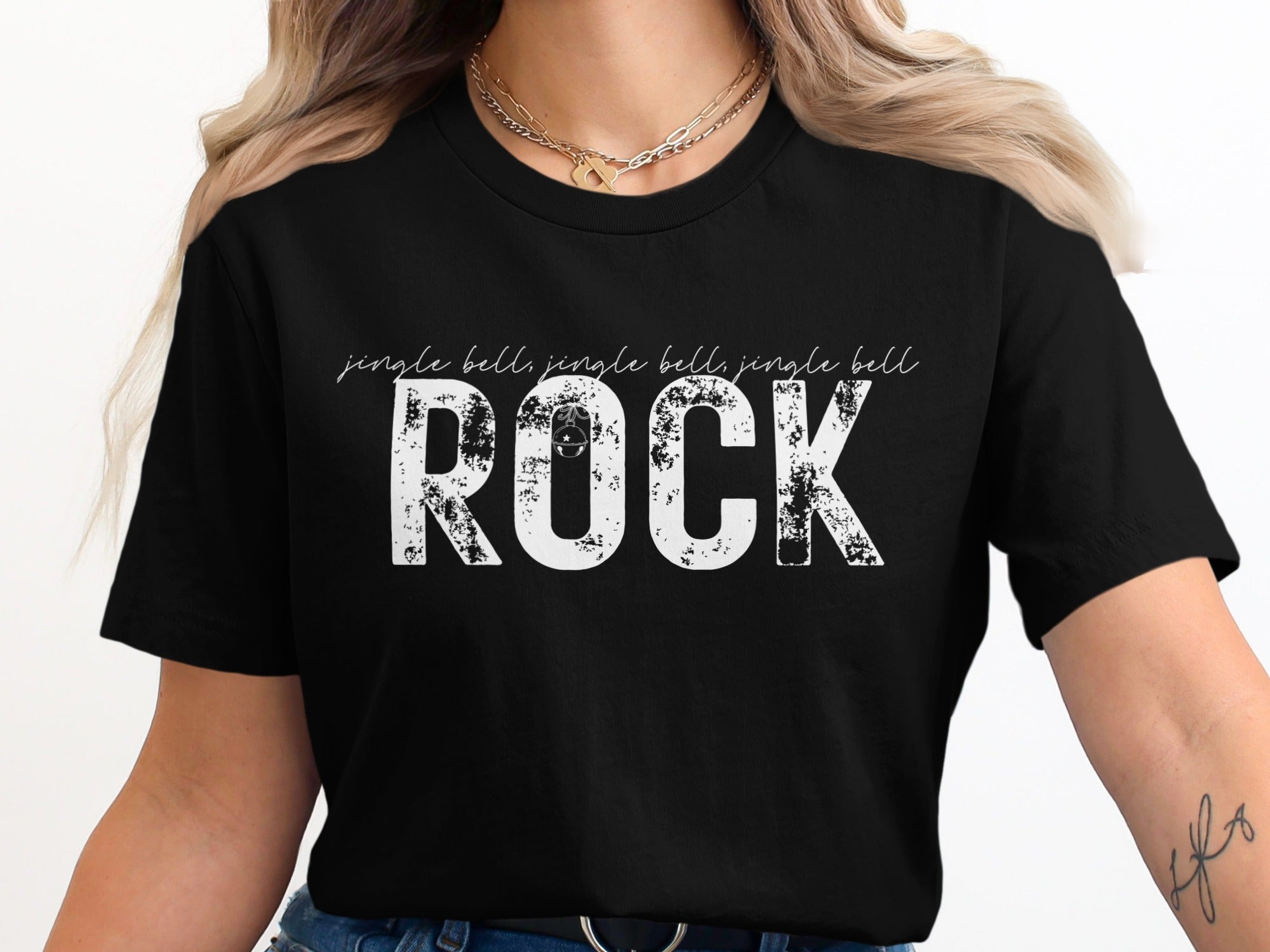 Black t-shirt with white text "jingle bell, jingle bell, jingle bell, rock"