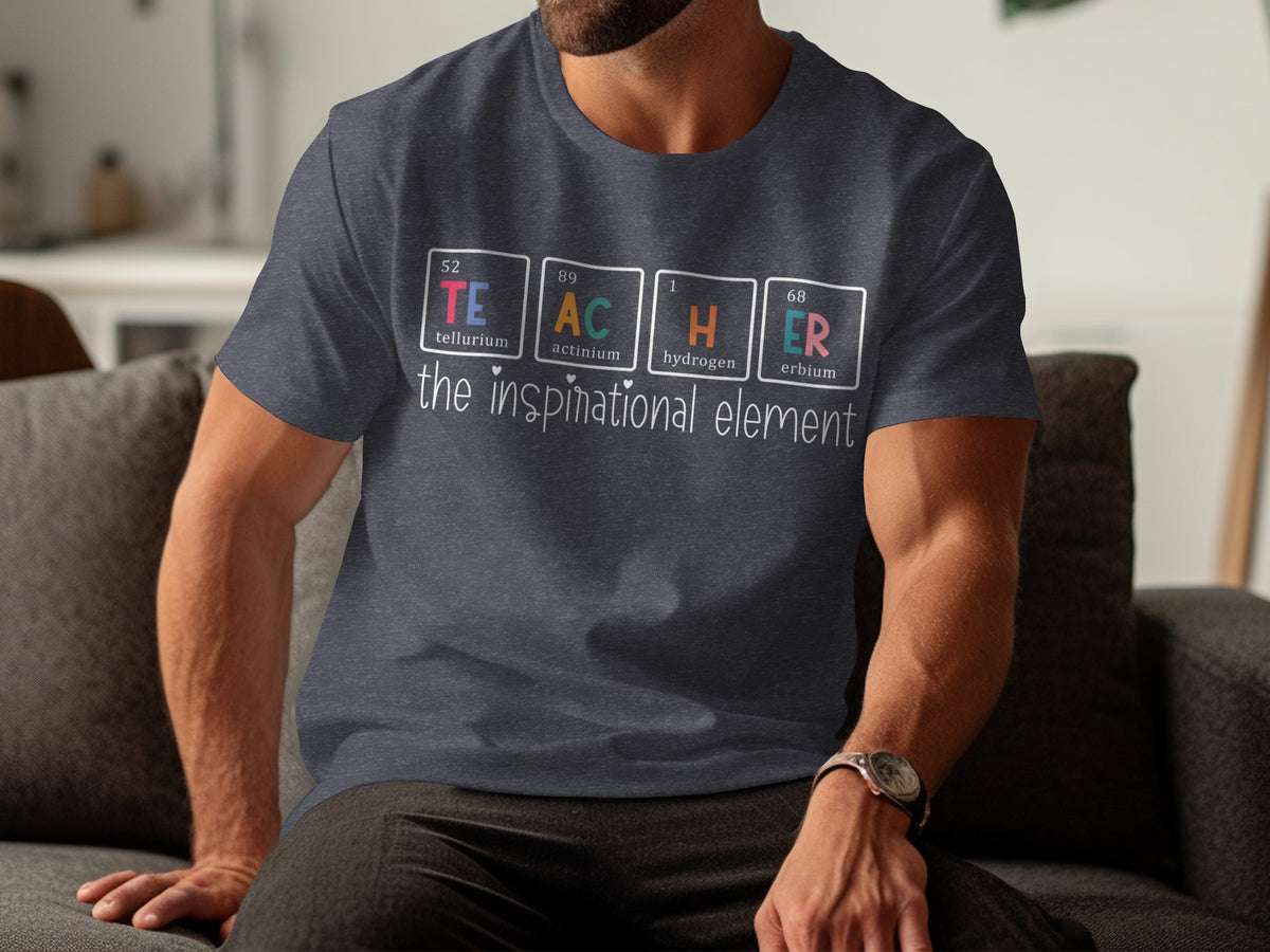 Dark gray t-shirt with "TEACHER" spelled using periodic table elements and "the inspirational element."