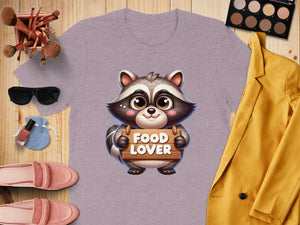 T-shirt with cartoon raccoon holding "Food Lover" sign.
