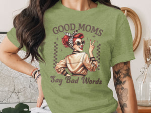 Green t-shirt with "Good Moms Say Bad Words" text and retro pin-up graphic.