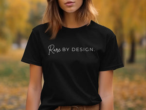 Black t-shirt with white text "Rare BY DESIGN."
