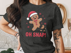 Gingerbread man in Santa hat with "OH SNAP!" text and broken leg.