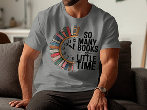 Grey t-shirt with a clock graphic made of books and text "So Many Books So Little Time".